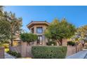 Attractive home with a walled courtyard, desert landscaping, and mature shade trees at 7201 Mission Hills Dr, Las Vegas, NV 89113