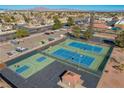 Aerial view featuring sports courts, including four tennis courts and two basketball courts at 1561 Doran Dr, Las Vegas, NV 89123