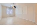 Neutral dining area showcasing a window with blinds and tile flooring at 8732 Kendall Brook Cir, Las Vegas, NV 89149
