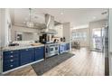 Spacious kitchen featuring stainless steel appliances, blue cabinets, and an open layout at , Las Vegas, NV 89149