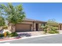Charming single-story home with a well-manicured lawn and inviting curb appeal at 10181 Mount Harlow Ct, Las Vegas, NV 89141