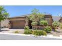 Charming single-story home with a well-manicured lawn and inviting curb appeal at 10181 Mount Harlow Ct, Las Vegas, NV 89141