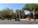 Charming two-story home with landscaped front yard and covered porch entry at 10804 Mason Hill Ave, Las Vegas, NV 89166