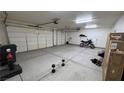 Spacious three car garage with ample room for parking and storage at 210 Magnolia Blvd, Pahrump, NV 89048