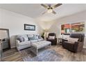Inviting living room featuring neutral tones, comfortable seating, and a ceiling fan at 890 Kitty Hawk Dr # 2412, Mesquite, NV 89027