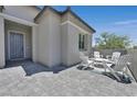 Inviting courtyard with patio seating, perfect for outdoor relaxation at 112 Springbough Ln, Las Vegas, NV 89138