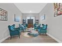 Cozy sitting area with comfortable chairs and stylish decor at 112 Springbough Ln, Las Vegas, NV 89138