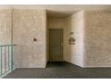 Exterior entryway featuring secure door, welcome sign, and textured stucco walls at 3550 Bay Sands Dr # 3089, Laughlin, NV 89029