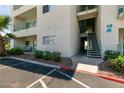 Exterior view of condominium entry showcasing patio and stairs at 3550 Bay Sands Dr # 3089, Laughlin, NV 89029