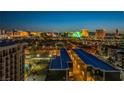 Scenic aerial view of the property showing the community pool and surrounding buildings at 3930 University Center Dr # 412, Las Vegas, NV 89119