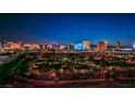 Striking nighttime view of the city skyline featuring vibrant lights and iconic landmarks at 3930 University Center Dr # 412, Las Vegas, NV 89119