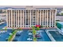 Exterior of a multi-story building showcasing ample parking and well-maintained grounds at 3930 University Center Dr # 412, Las Vegas, NV 89119