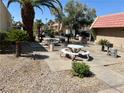 Common picnic area with tables, gravel landscaping, and mature trees at 5020 Indian River Dr # 432, Las Vegas, NV 89103