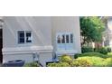 Well-maintained exterior with manicured landscaping, lush greenery, and mature trees at 9050 W Warm Springs Rd # 1092, Las Vegas, NV 89148