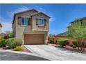 Charming two-story home with a well-maintained front yard and two car garage at 10656 Hyde Corner Ave, Las Vegas, NV 89166