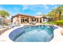 Stunning pool with hot tub and outdoor entertaining area at 11 Knob Oak Dr, Henderson, NV 89052