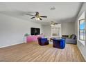Bright living room featuring hard surface floors and contemporary furnishings at 2935 Hardin Dr, Henderson, NV 89074