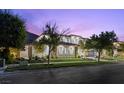 Stylish two-story home boasting manicured lawn and modern facade at 42 Ravenswood Ave, Las Vegas, NV 89141