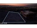 Large lot featuring a building in progress, showcasing potential for a custom home with city views at 611 Grand Rim Dr, Henderson, NV 89012