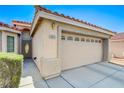Charming single-story home with a two-car garage and desert landscaping in a well-kept neighborhood at 6656 Arctic Breeze St, North Las Vegas, NV 89084