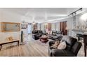 Spacious living room with a fireplace, plush seating, and elegant decor at 700 Capri Dr # 27B, Boulder City, NV 89005
