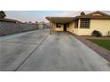 Long driveway leading up to the house and carport at 706 Red Lake Way, Las Vegas, NV 89110