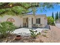 Welcoming front porch featuring desert-friendly landscaping and decorative accents at 2839 Goldcreek St, Henderson, NV 89052