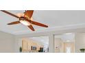 Open-concept living room with a ceiling fan and views of the kitchen at 2839 Goldcreek St, Henderson, NV 89052