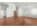 Spacious open living area with wood flooring and ample natural light at 1132 Coral Desert Dr, Las Vegas, NV 89123