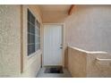 Inviting entrance with a well-lit doorway, providing a warm welcome at 2925 Wigwam Pkwy # 123, Henderson, NV 89074