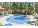 Community pool with ample lounge seating offers a refreshing escape on sunny days at 2925 Wigwam Pkwy # 123, Henderson, NV 89074