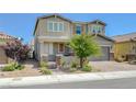 Charming two-story home featuring a manicured front yard and a spacious two-car garage at 2940 Duverney Ave, Henderson, NV 89044