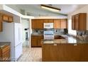 The kitchen offers lots of counterspace, modern appliances, and an eat-in breakfast bar at 4021 Broadriver Dr, Las Vegas, NV 89108