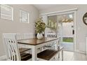 Eat-in dining area with a sliding glass door for easy access to the outdoor space at 5108 Molveno Ct, Las Vegas, NV 89130