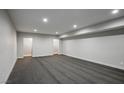 Spacious finished basement featuring neutral carpet, recessed lighting, and ample room for entertaining at 7060 W Rome Blvd, Las Vegas, NV 89131