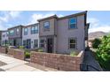 Charming townhome featuring a gated courtyard and modern architectural design at 756 Sleeping City Ave, Henderson, NV 89015