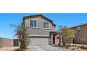 Attractive two-story house boasts a gray facade, complemented by a landscaped front yard at 9054 Tangerine Tree Ct, Las Vegas, NV 89113