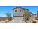 Beautiful two-story residence with a gray exterior and low-maintenance desert landscaping at 9054 Tangerine Tree Ct, Las Vegas, NV 89113