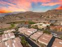 Panoramic aerial shot capturing a neighborhood with a baseball field and mountain views at 251 Big Horn Dr, Boulder City, NV 89005