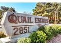 Quail Estates West community sign surrounded by lush landscaping and mature trees at 2851 S Valley View Blvd # 1039, Las Vegas, NV 89102