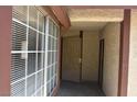 Entryway with windows, a security door and two doors at 4041 Saguaro Ln, Las Vegas, NV 89110