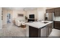 Open-concept kitchen and great room with modern finishes and ample space at 633 Bellus Pl # Lot 153, Henderson, NV 89015