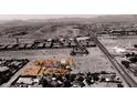 Aerial view of home near City Overlook Circle, highlighting desert landscape at 7720 W Agate Ave, Las Vegas, NV 89113