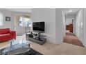 Bright living space boasts lots of natural light and modern media center for comfortable viewing at 270 E Flamingo Rd # 106, Las Vegas, NV 89169