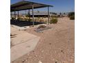 View of the carport and surrounding area at 7052 W Meranto Ave, Las Vegas, NV 89178