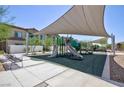 Community playground with shade structure and play equipment at 835 Aurelie Ridge St, Henderson, NV 89011