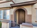 Multi-Gathering home featuring a covered entryway and gate at 10231 Deerfield Beach Ave # 104, Las Vegas, NV 89129