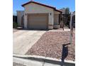 Inviting single-story home with a well-maintained front yard and a convenient driveway at 2362 Sierra Sunrise St, Las Vegas, NV 89156