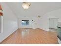 Bright living room with hardwood floors, fresh paint, and lots of natural light at 4624 Windy Hollow St, Las Vegas, NV 89130