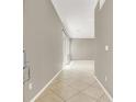 Inviting entryway with tile flooring and a view into the adjacent living spaces at 9225 Dalmahoy Pl, Las Vegas, NV 89145